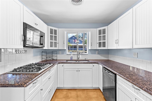 360 W University Ave, Orange City, FL 32763 - kitchen featuring black appliances, a sink, white cabinetry, and glass insert cabinets