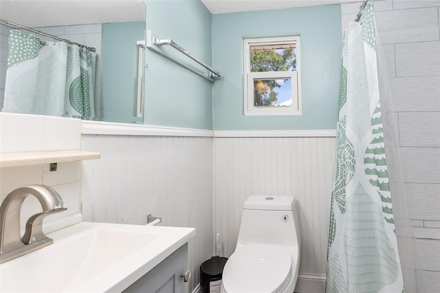 360 W University Ave, Orange City, FL 32763 - bathroom with a wainscoted wall, toilet, curtained shower, and vanity