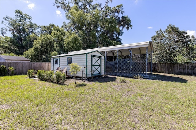 360 W University Ave, Orange City, FL 32763 - view of outbuilding featuring a carport and an outdoor structure