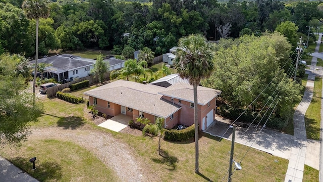 360 W University Ave, Orange City, FL 32763 - view from above of property with a forest