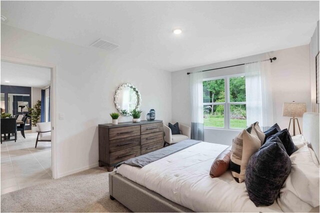 bedroom featuring baseboards and recessed lighting
