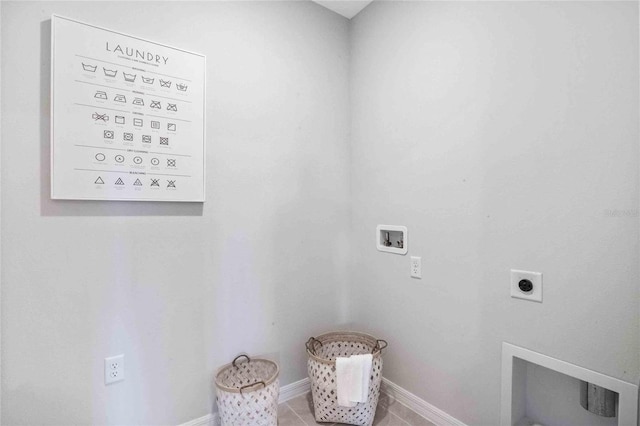 laundry room with hookup for a washing machine, baseboards, tile patterned floors, and hookup for an electric dryer