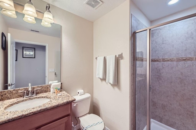 3055 Beach Palm Ave, Kissimmee, FL 34747 - bathroom with a shower stall, toilet, and vanity