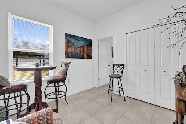 606 Marion Oaks Blvd, Ocala, FL 34473 - dining space with healthy amount of natural light, light tile patterned floors, and baseboards