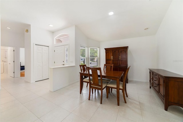 1243 Tangerine Cir, Lady Lake, FL 32159 - dining area featuring baseboards, vaulted ceiling, recessed lighting, and light tile patterned floors