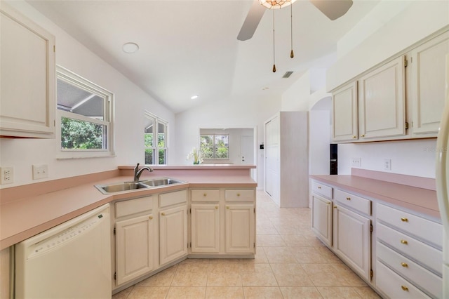 1243 Tangerine Cir, Lady Lake, FL 32159 - kitchen with dishwasher, a sink, a peninsula, light tile patterned flooring, and ceiling fan