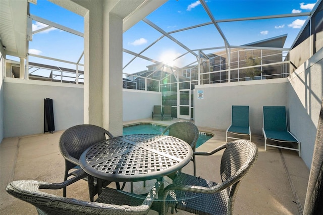 1128 Challenge Dr, Davenport, FL 33896 - view of patio / terrace with outdoor dining space, an outdoor pool, and a lanai