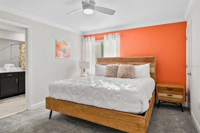 1128 Challenge Dr, Davenport, FL 33896 - carpeted bedroom featuring ornamental molding, connected bathroom, baseboards, and ceiling fan