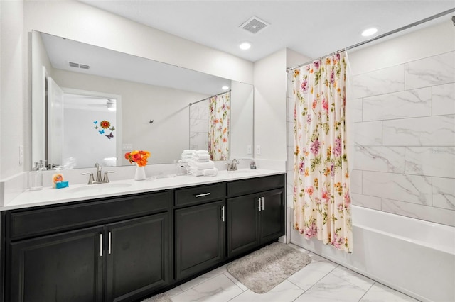 1128 Challenge Dr, Davenport, FL 33896 - bathroom featuring marble finish flooring, double vanity, shower / bath combo, and recessed lighting