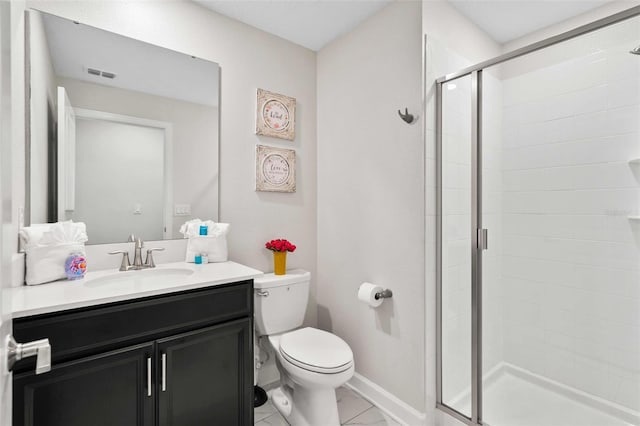 1128 Challenge Dr, Davenport, FL 33896 - bathroom with vanity, toilet, a stall shower, and baseboards