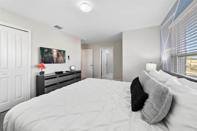 1128 Challenge Dr, Davenport, FL 33896 - bedroom featuring a closet and baseboards