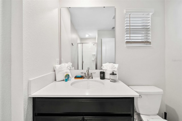 1128 Challenge Dr, Davenport, FL 33896 - full bathroom with vanity, a stall shower, and toilet