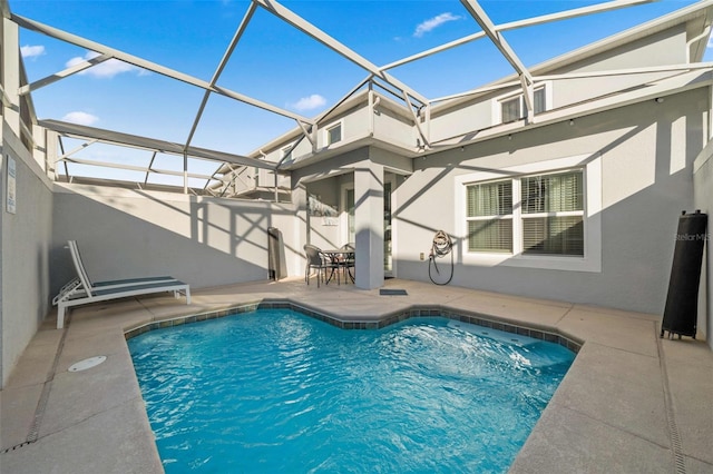 1128 Challenge Dr, Davenport, FL 33896 - outdoor pool with a patio area and a lanai