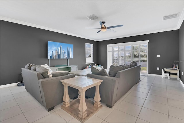 living area featuring crown molding, ceiling fan, light tile patterned floors, and baseboards