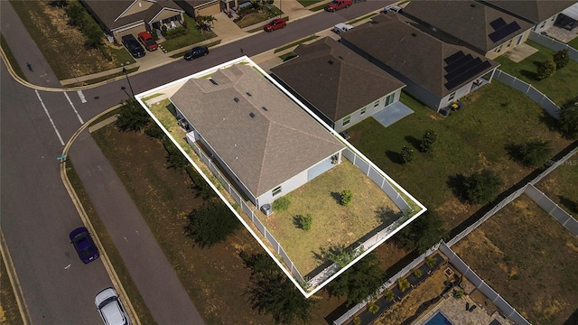 aerial perspective of suburban area featuring property boundaries highlighted