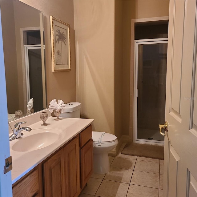 225 Vista Dr, Davenport, FL 33897 - full bathroom featuring tile patterned flooring, a stall shower, toilet, and vanity