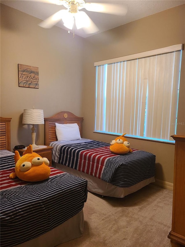 225 Vista Dr, Davenport, FL 33897 - carpeted bedroom with ceiling fan