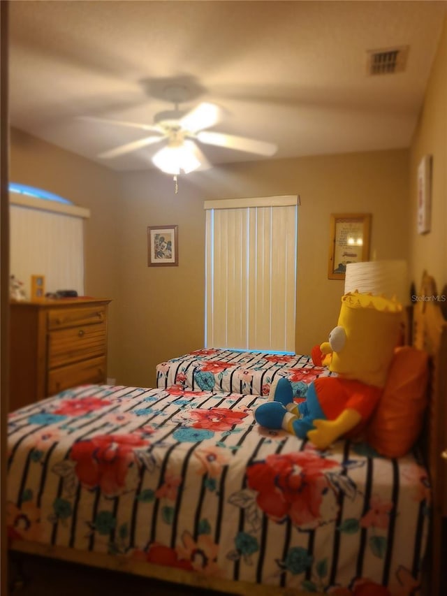 225 Vista Dr, Davenport, FL 33897 - bedroom featuring a ceiling fan