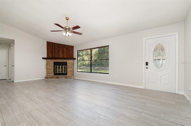 175 Cliff St, Deland, FL 32720 - unfurnished living room with ceiling fan, lofted ceiling, a fireplace, and baseboards