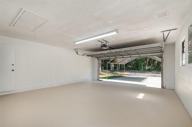 175 Cliff St, Deland, FL 32720 - garage featuring a garage door opener