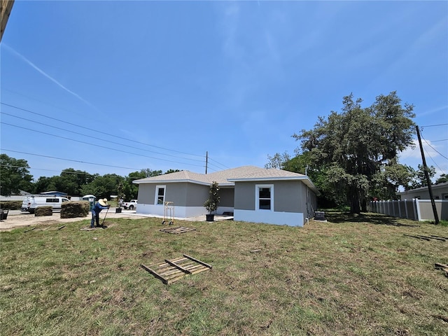 141 W G H Washington St, Apopka, FL 32703 - view of home's exterior with stucco siding