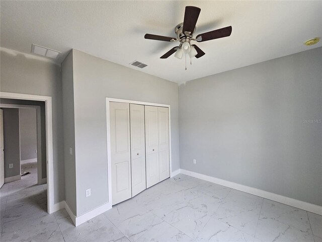 141 W G H Washington St, Apopka, FL 32703 - unfurnished bedroom featuring light marble finish flooring and baseboards