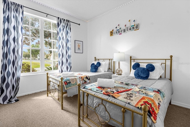 217 Holborn Loop, Davenport, FL 33897 - carpeted bedroom featuring multiple windows and baseboards