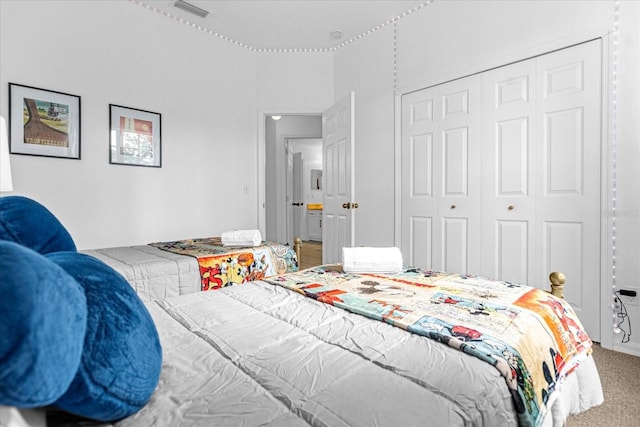 217 Holborn Loop, Davenport, FL 33897 - carpeted bedroom featuring a closet