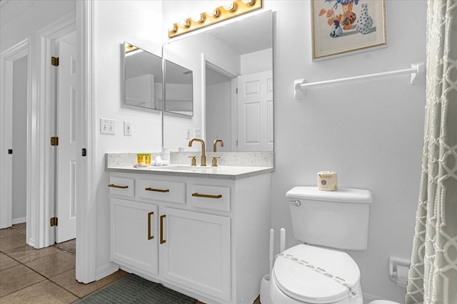 217 Holborn Loop, Davenport, FL 33897 - full bathroom with toilet, tile patterned flooring, and vanity