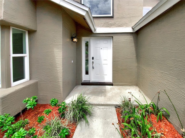 721 Rock Creek Loop, Longwood, FL 32750 - property entrance with stucco siding