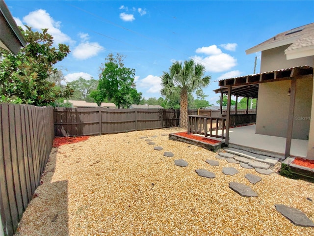 721 Rock Creek Loop, Longwood, FL 32750 - fenced backyard with a patio area