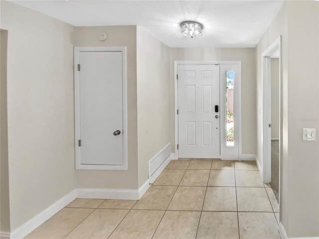 721 Rock Creek Loop, Longwood, FL 32750 - entrance foyer featuring light tile patterned flooring and baseboards