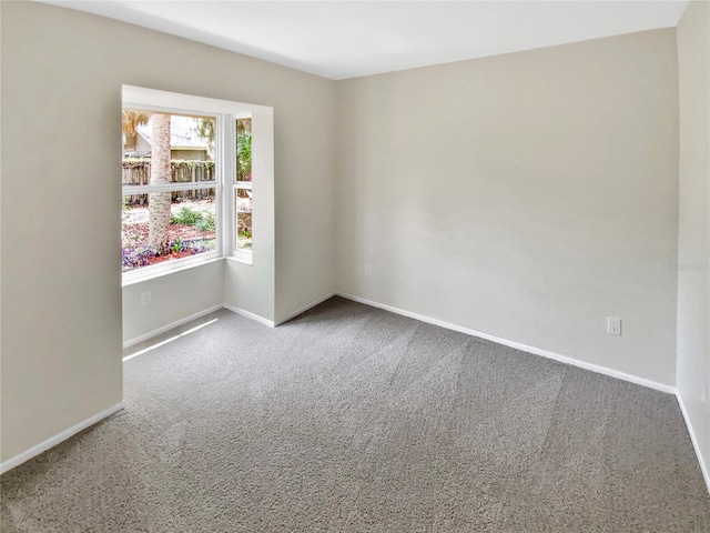 721 Rock Creek Loop, Longwood, FL 32750 - spare room with carpet flooring and baseboards