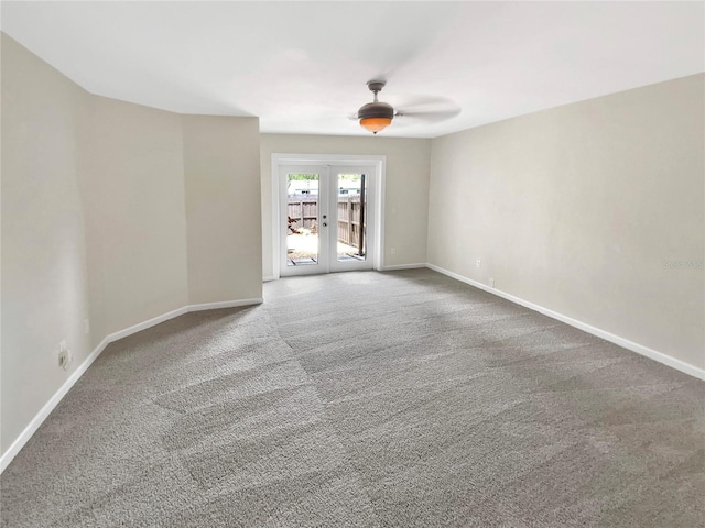 721 Rock Creek Loop, Longwood, FL 32750 - empty room featuring french doors, carpet floors, and baseboards