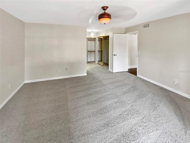 721 Rock Creek Loop, Longwood, FL 32750 - carpeted spare room with baseboards and a ceiling fan
