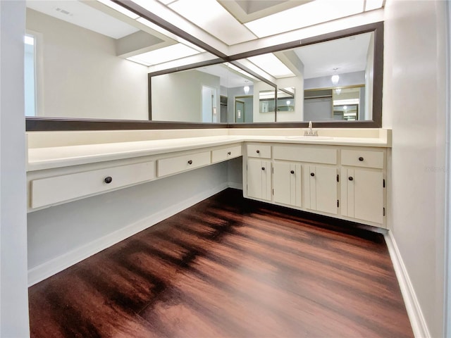 721 Rock Creek Loop, Longwood, FL 32750 - bathroom with wood finished floors, vanity, and baseboards