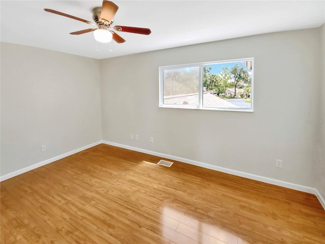 721 Rock Creek Loop, Longwood, FL 32750 - unfurnished room with light wood-style flooring, baseboards, and ceiling fan