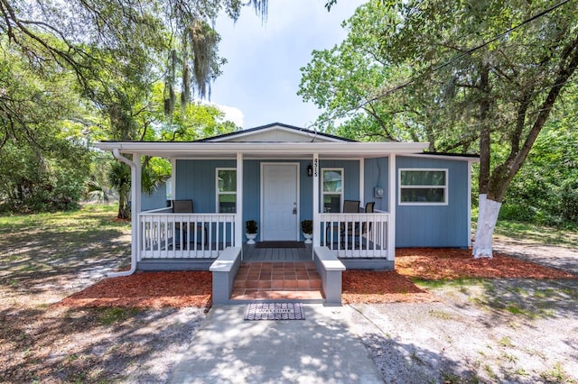 4515 Isaac Ln, Sanford, FL 32771 - view of front of house with a porch