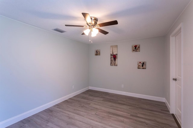 4515 Isaac Ln, Sanford, FL 32771 - empty room featuring wood finished floors, ceiling fan, and baseboards