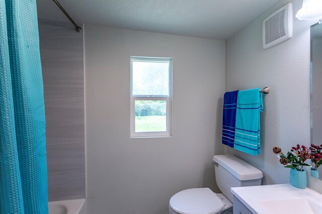 4515 Isaac Ln, Sanford, FL 32771 - full bath with toilet, vanity, and shower / tub combo with curtain
