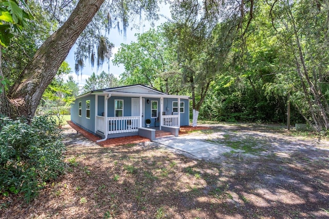 4515 Isaac Ln, Sanford, FL 32771 - view of front of property featuring covered porch