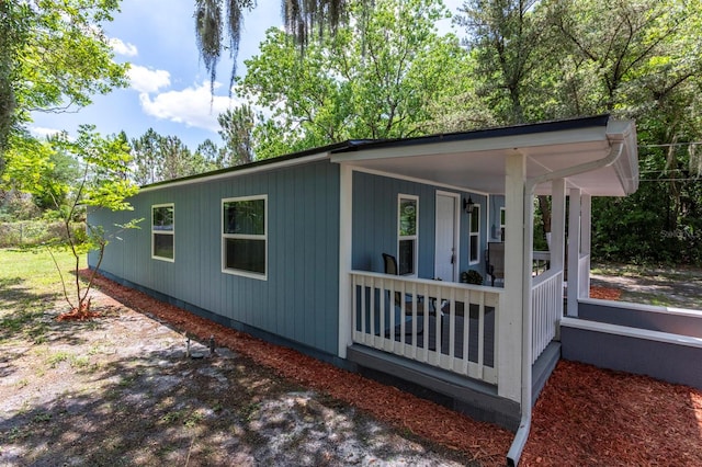 4515 Isaac Ln, Sanford, FL 32771 - view of side of property with covered porch