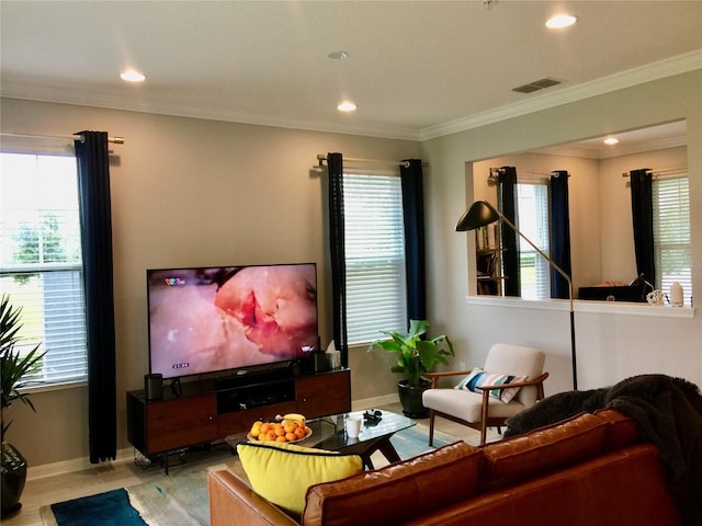 15708 Orange Harvest Loop, Winter Garden, FL 34787 - living room featuring ornamental molding, healthy amount of natural light, baseboards, and recessed lighting