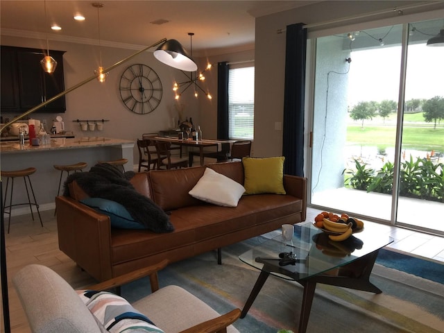 15708 Orange Harvest Loop, Winter Garden, FL 34787 - living room featuring crown molding