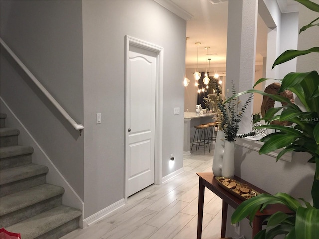 15708 Orange Harvest Loop, Winter Garden, FL 34787 - hallway with stairway, a chandelier, and baseboards