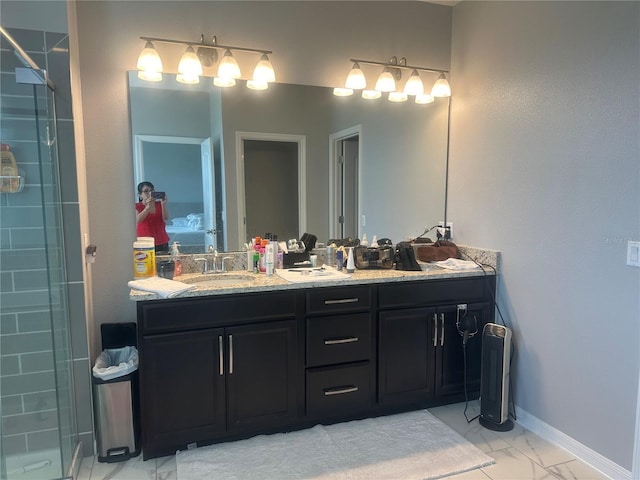 15708 Orange Harvest Loop, Winter Garden, FL 34787 - full bath with double vanity, marble look tile flooring, tiled shower, and baseboards