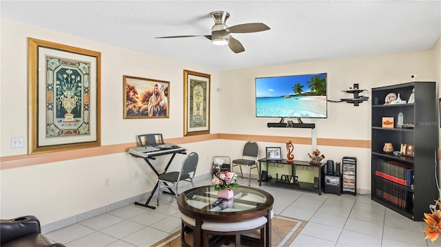 11257 Dacre Ln, Orlando, FL 32824 - living area with ceiling fan, light tile patterned flooring, and a textured ceiling