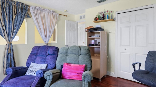 11257 Dacre Ln, Orlando, FL 32824 - living area featuring dark wood-type flooring