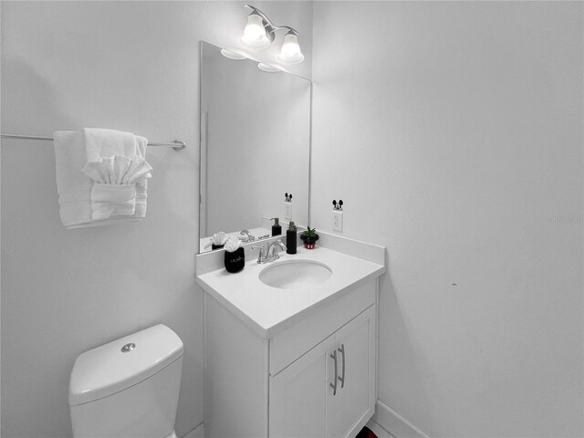 454 Captiva Dr, Davenport, FL 33896 - bathroom featuring vanity and toilet