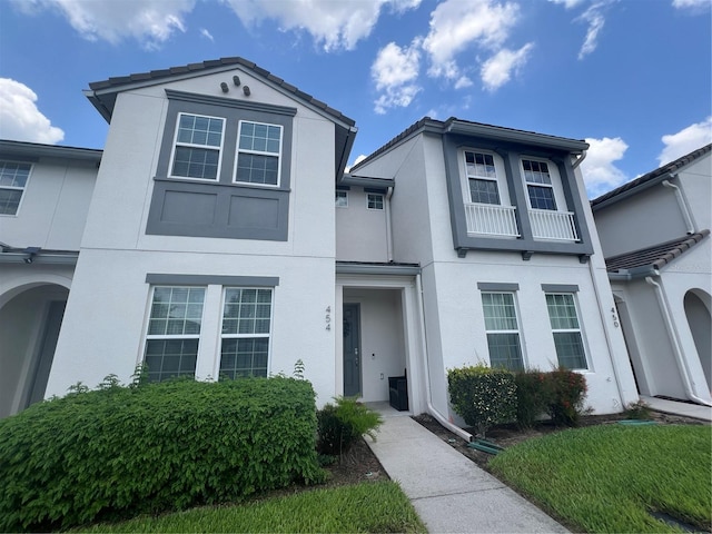 454 Captiva Dr, Davenport, FL 33896 - view of front of property with stucco siding